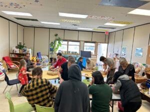 Youth and adults in community centre