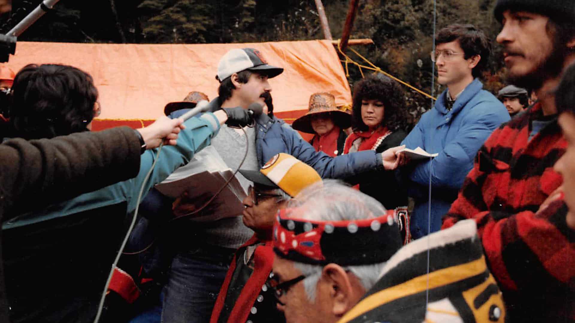 Court injunction paperwork is served to Haida citizens who stood the line in 1985 while media is present